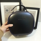 black leather round bag