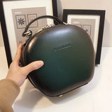 green leather round bag
