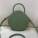 green round leather crossbody bag