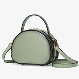 green round purse leather