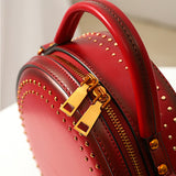 Red leather bag round