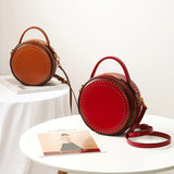 red round leather purse