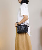 black satchel crossbody bag