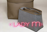 detial of Taupe Pebbled Leather Vertical Tote Bag
