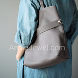 Taupe Pebbled Leather Vertical Tote Bag With Front Zipper Pocket And Matching Pouch DR