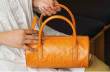 Small Leather Handbag
Mini Leather Boston Bag
Small Leather Top Handle Bag