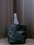 black leather bucket handbag