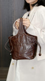 brown leather bucket handbag