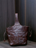 brown leather bucket handbag