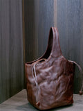 brown leather bucket handbag