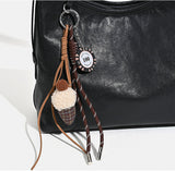 details of leather bucket bag