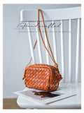 handwoven leather crossbody bag
interwoven leather crossbody bag
woven leather camera bag