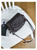 woven leather crossbody
handwoven leather crossbody bag
interwoven leather crossbody bag