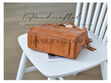 close-up of small genuine leather satchel crossbody bag leather handbag womens