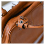close-up of genuine leather satchel bag