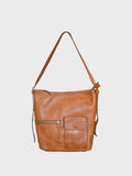 A medium brown leather shoulder bag with a front zippered pocket and a front slip pocket