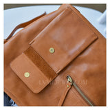 close-up of Genuine Leather Shoulder bucket Bag With Front Pocket 