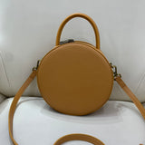 Brown leather round bag