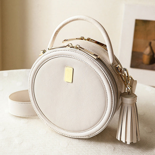 Small round handbags sales