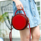 red round purse leather